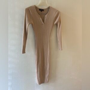 Gently used fitted tan dress. Cute with the right accessories!